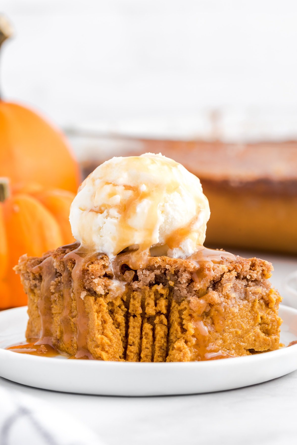 Pumpkin Dump Cake with ice cream topping