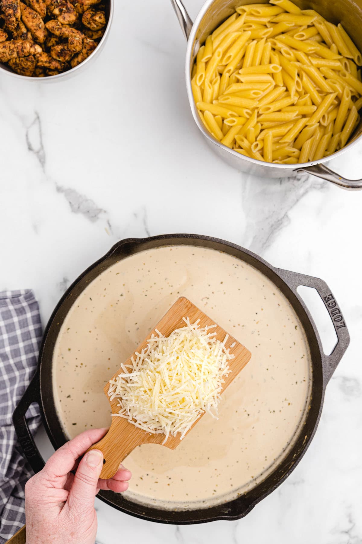 add parmesan cheese to the skillet