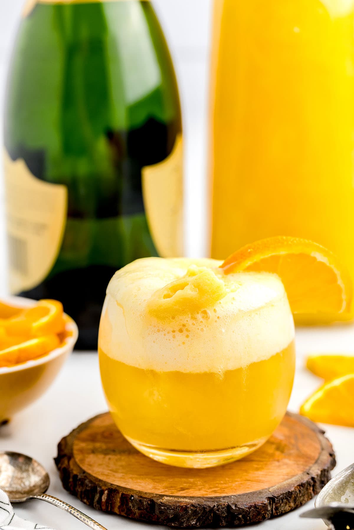 a glass of mimosa float