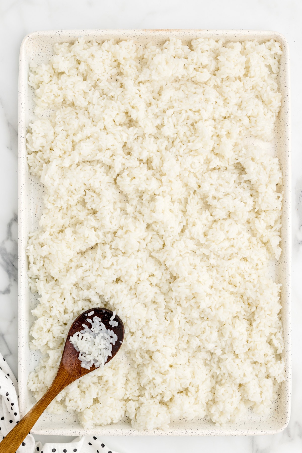 spread rice on the baking sheet