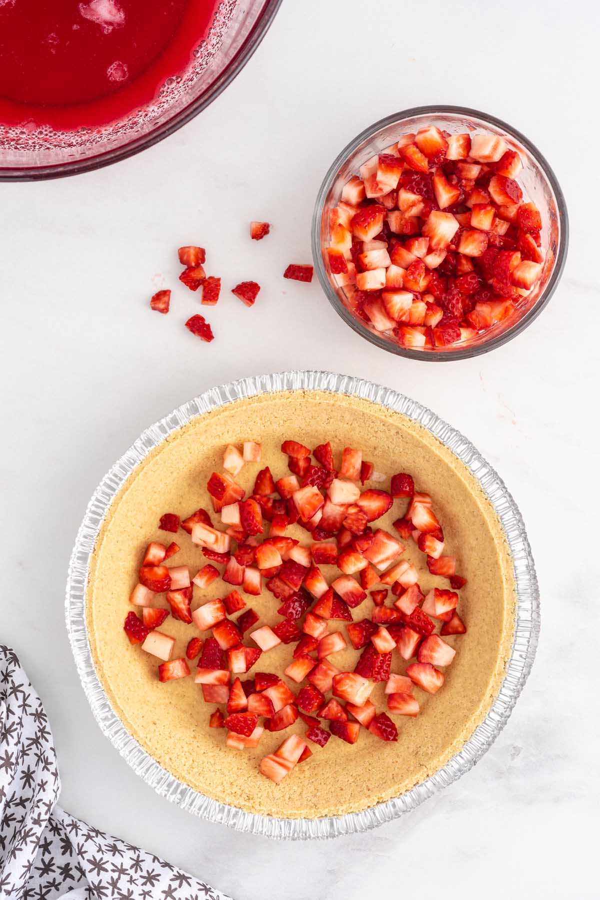 sprinkle strawberry into the pie crust