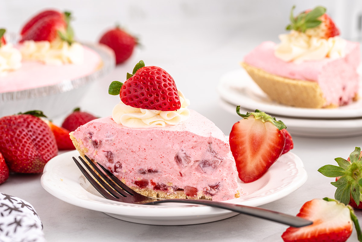 strawberry cool whip pie on a plate with fork