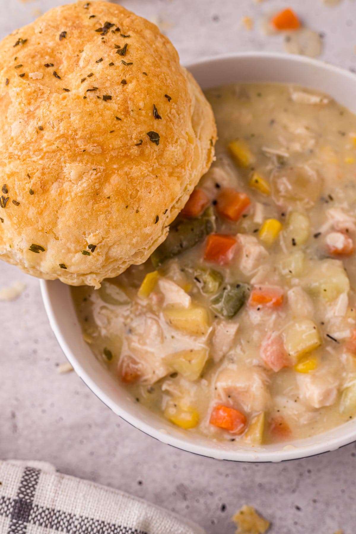 chicken pot pie soup with pastry on top.