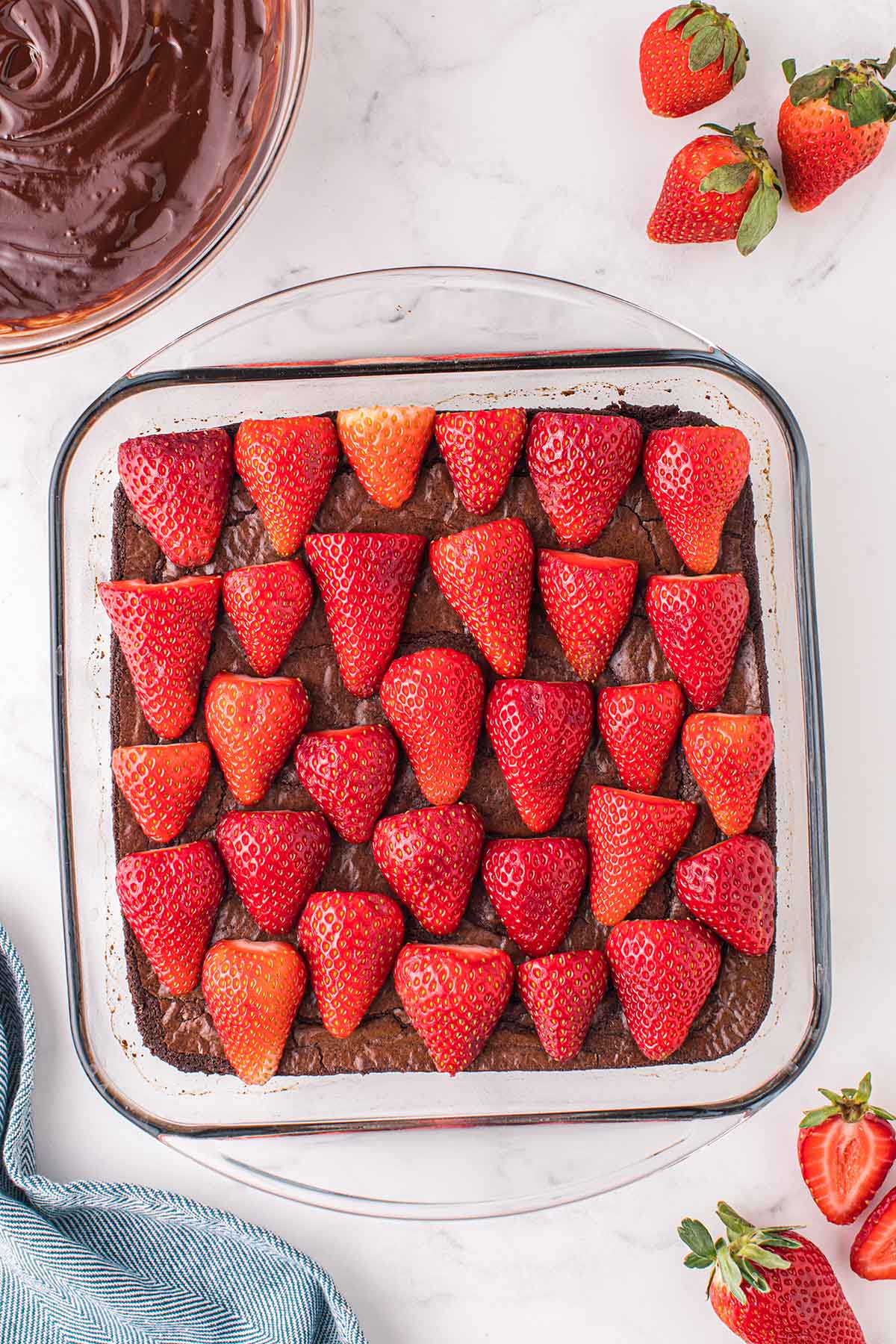 top with strawberries