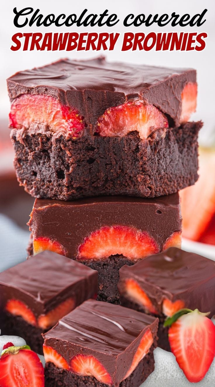 A stack of square shaped Chocolate Covered Strawberry Brownies.