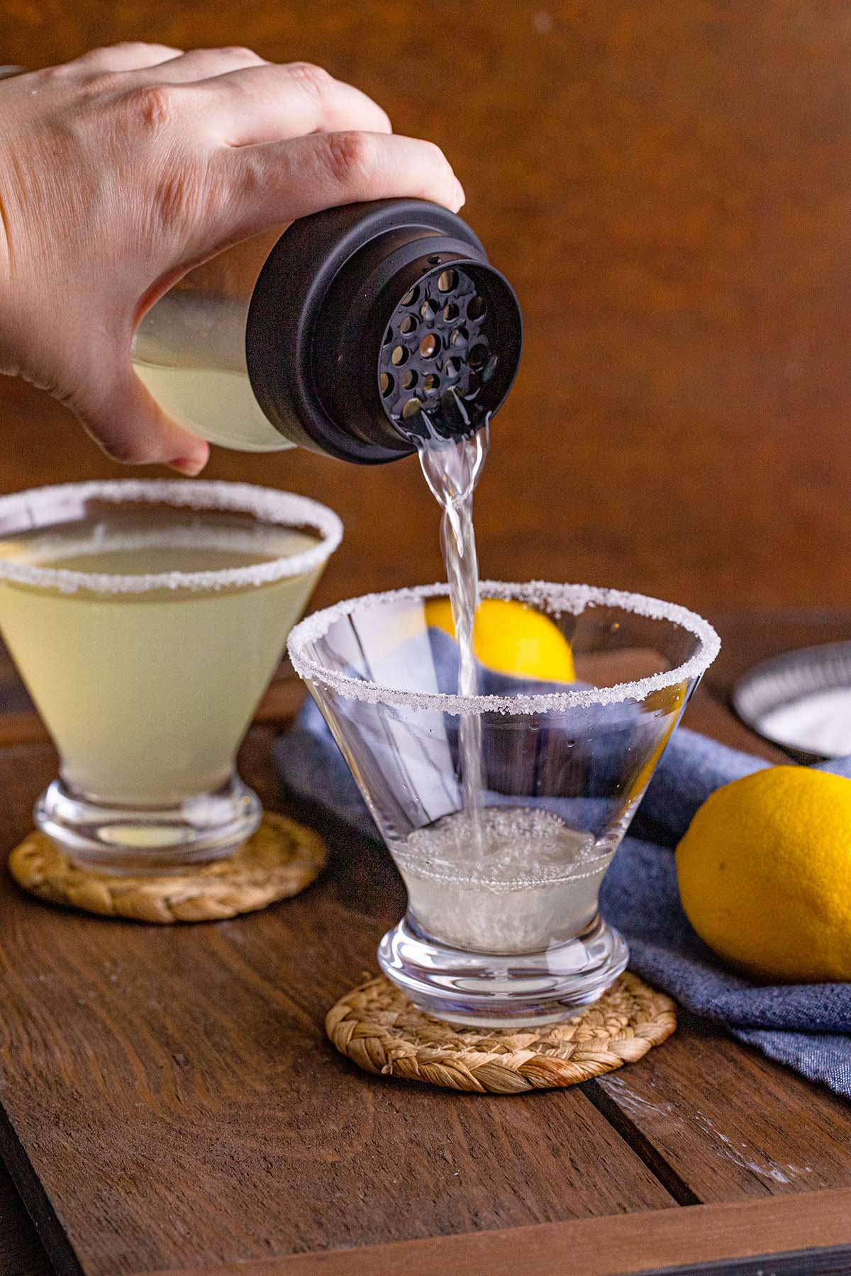 pour lemon martini to glass