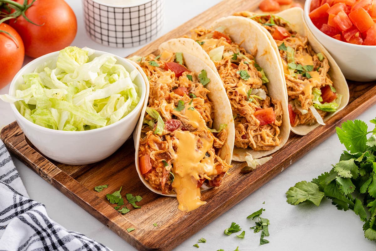 slow cooker queso chicken tacos