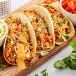 slow cooker queso chicken tacos featured image