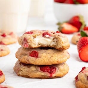 strawberry cheesecake cookies stacked.