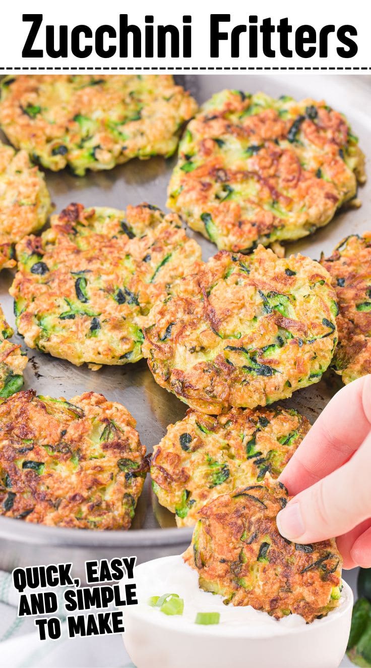 Zucchini Fritters sizzling on a frying pan. A hand dipping Zucchini Fritters into a sour cream dip.