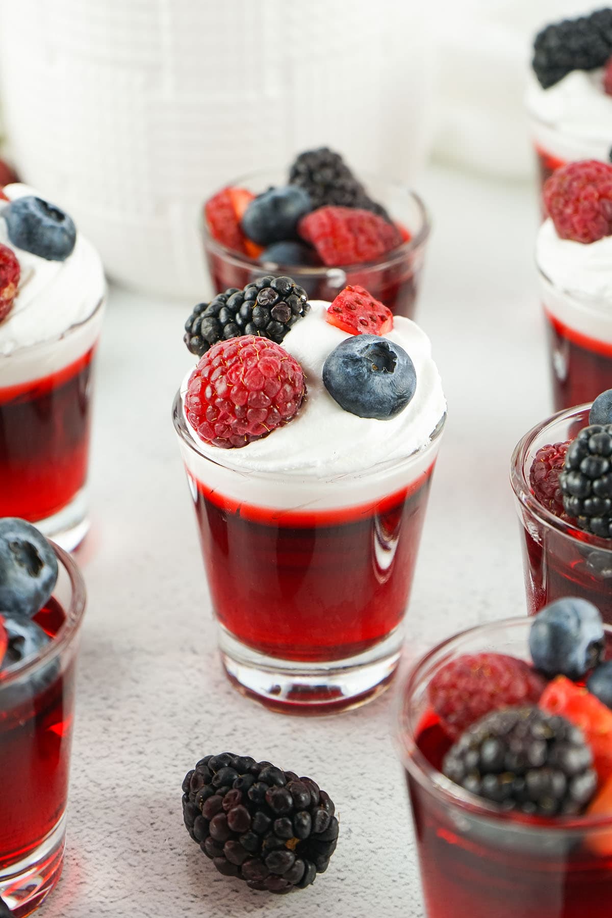 berry sangria shots with fruit topping