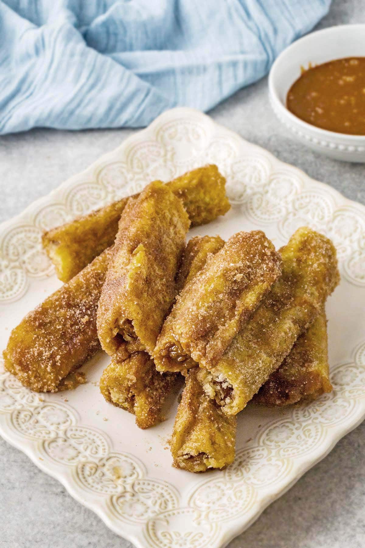 Churro French Toast Rolls on a plate