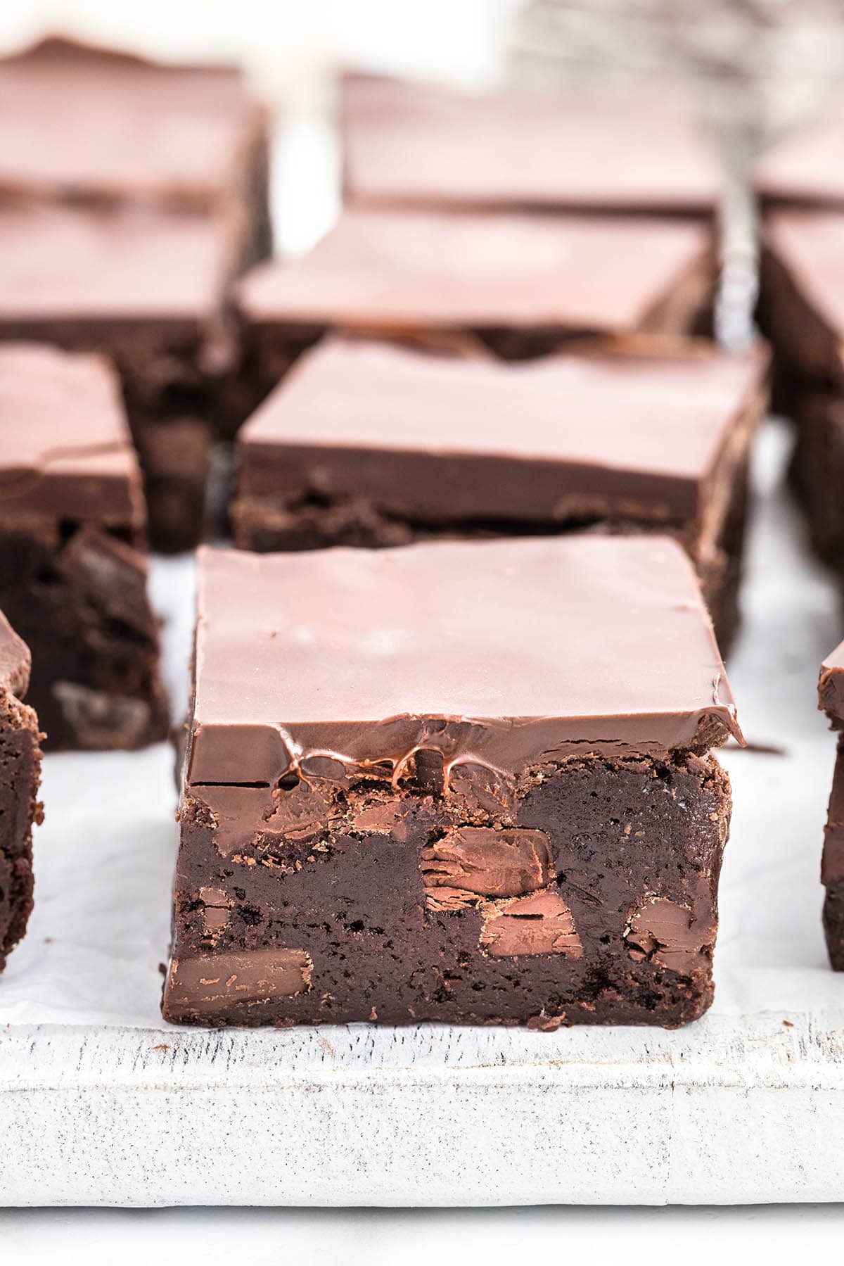 a square of Triple Chocolate Brownies