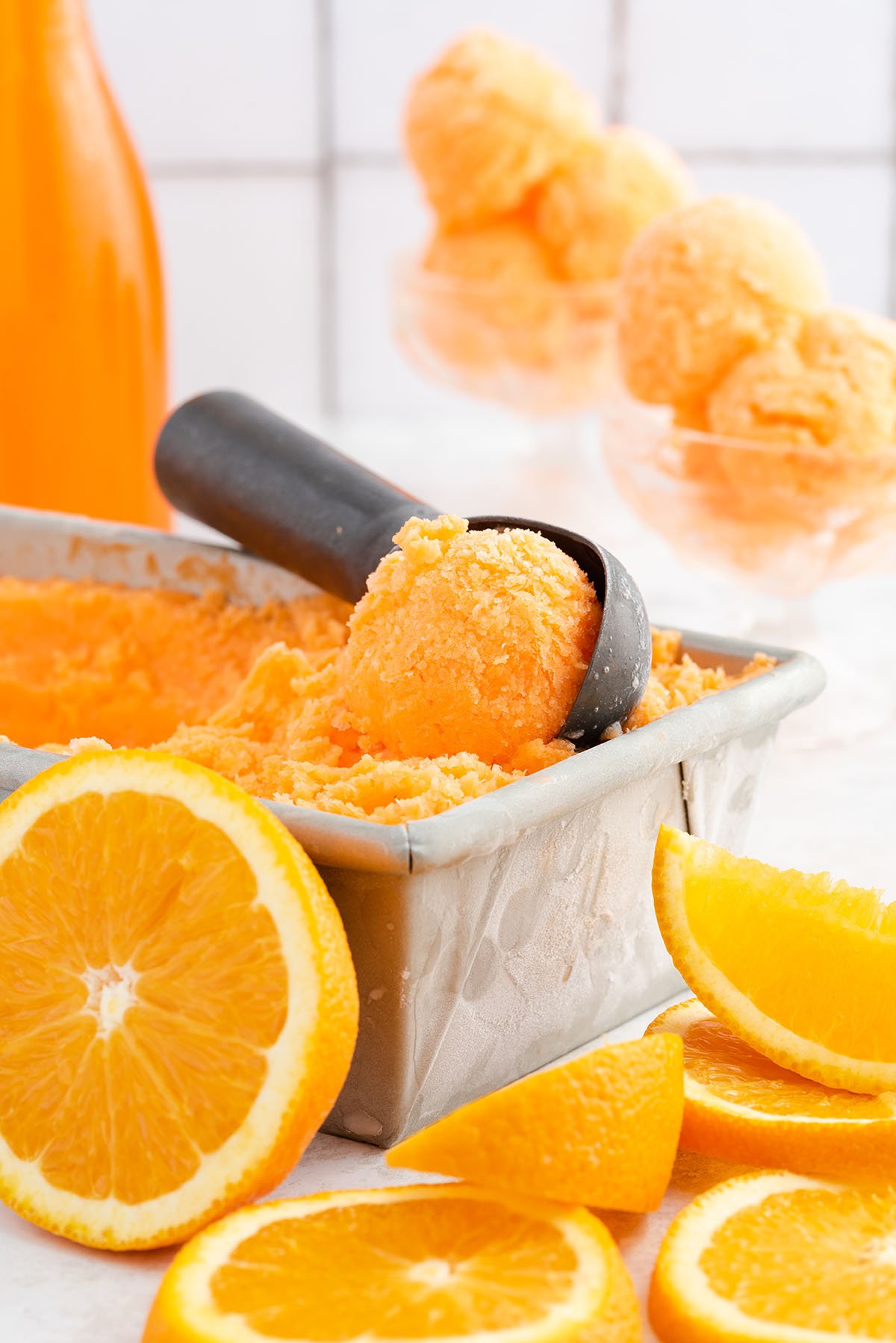 scooping orange sherbet