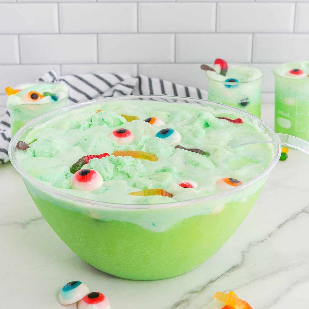 punch bowl with green sherbet punch with floating candy