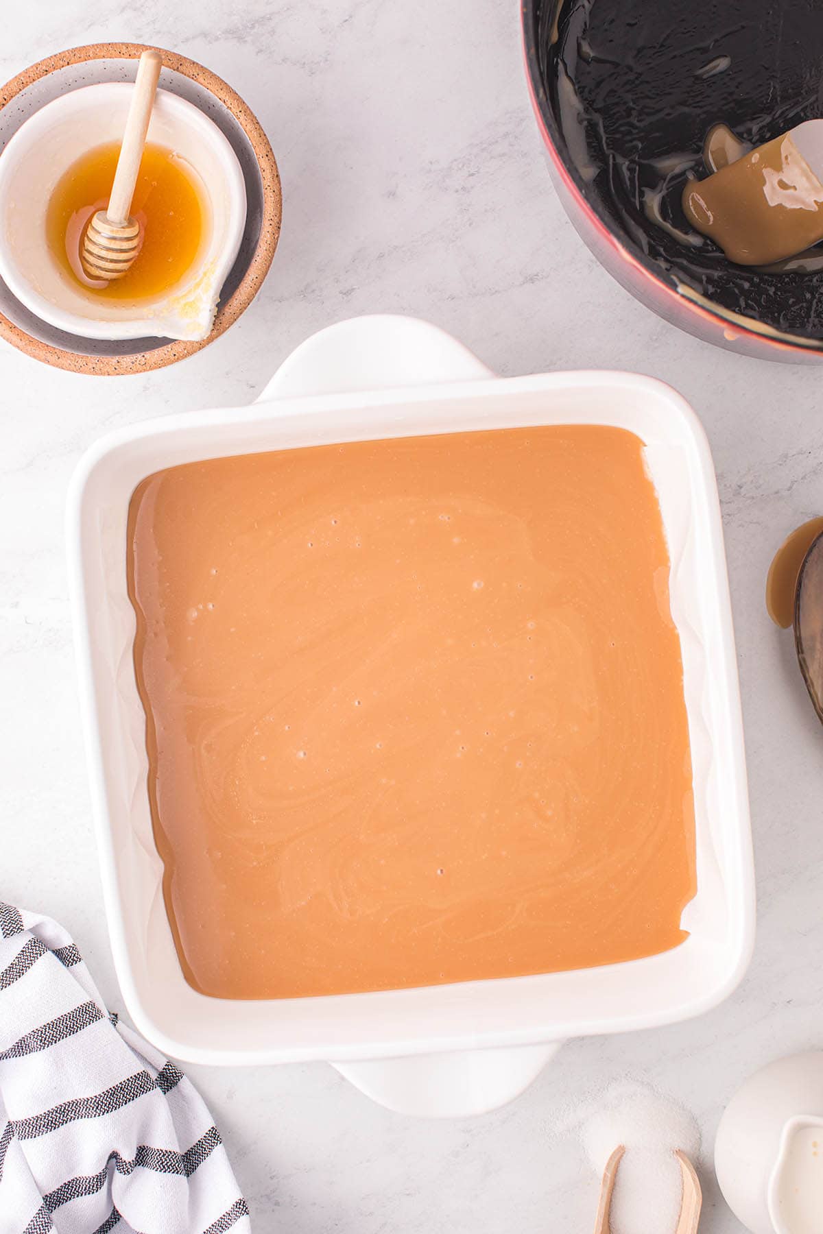 pour the caramel mixture into the pan.