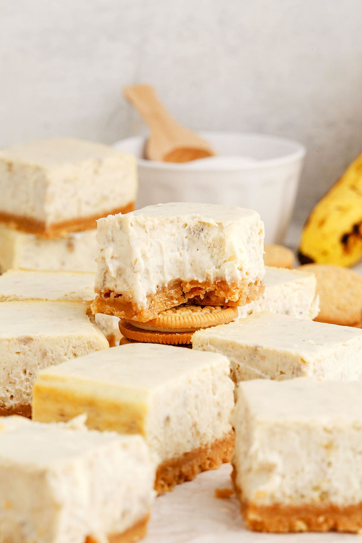 Banana Cream Pie Cheesecake Bars with a bite