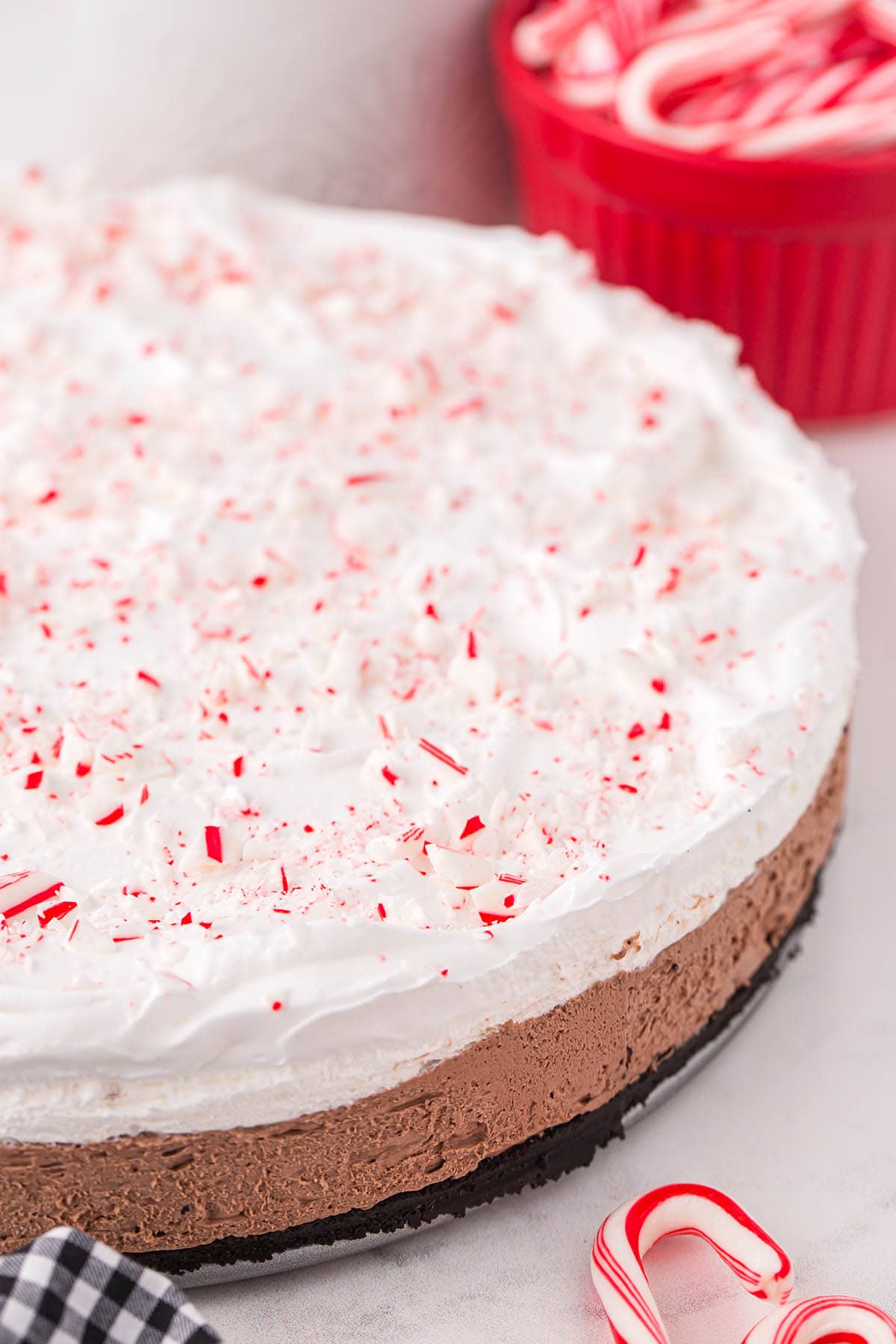 chocolate peppermint cheesecake with candy cane toppings