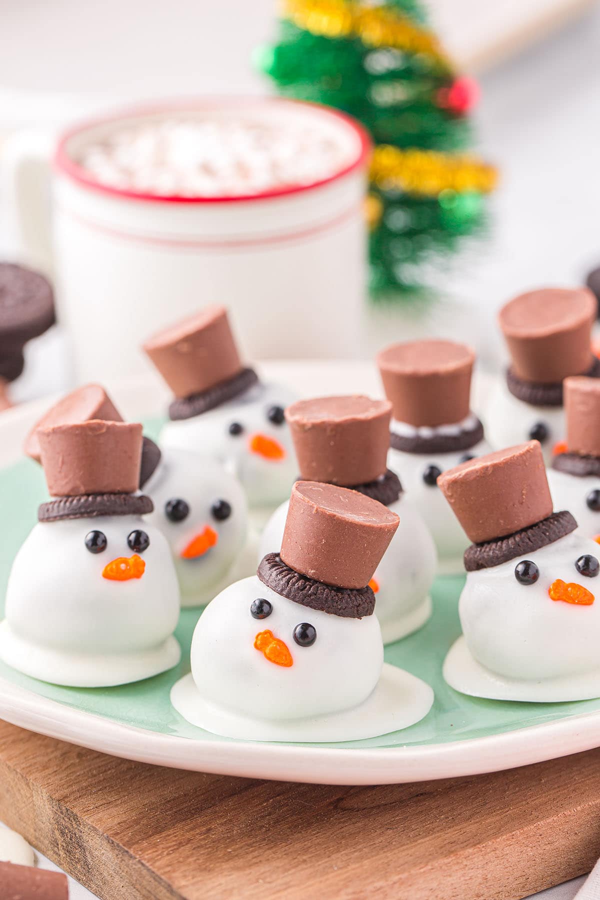 melted snowman oreo balls on plate