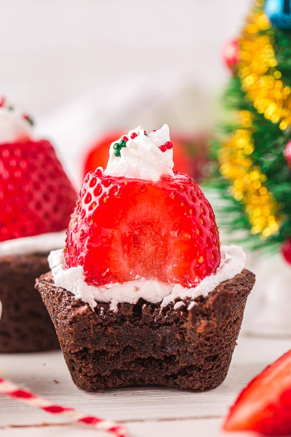 Santa hat brownies with small bite