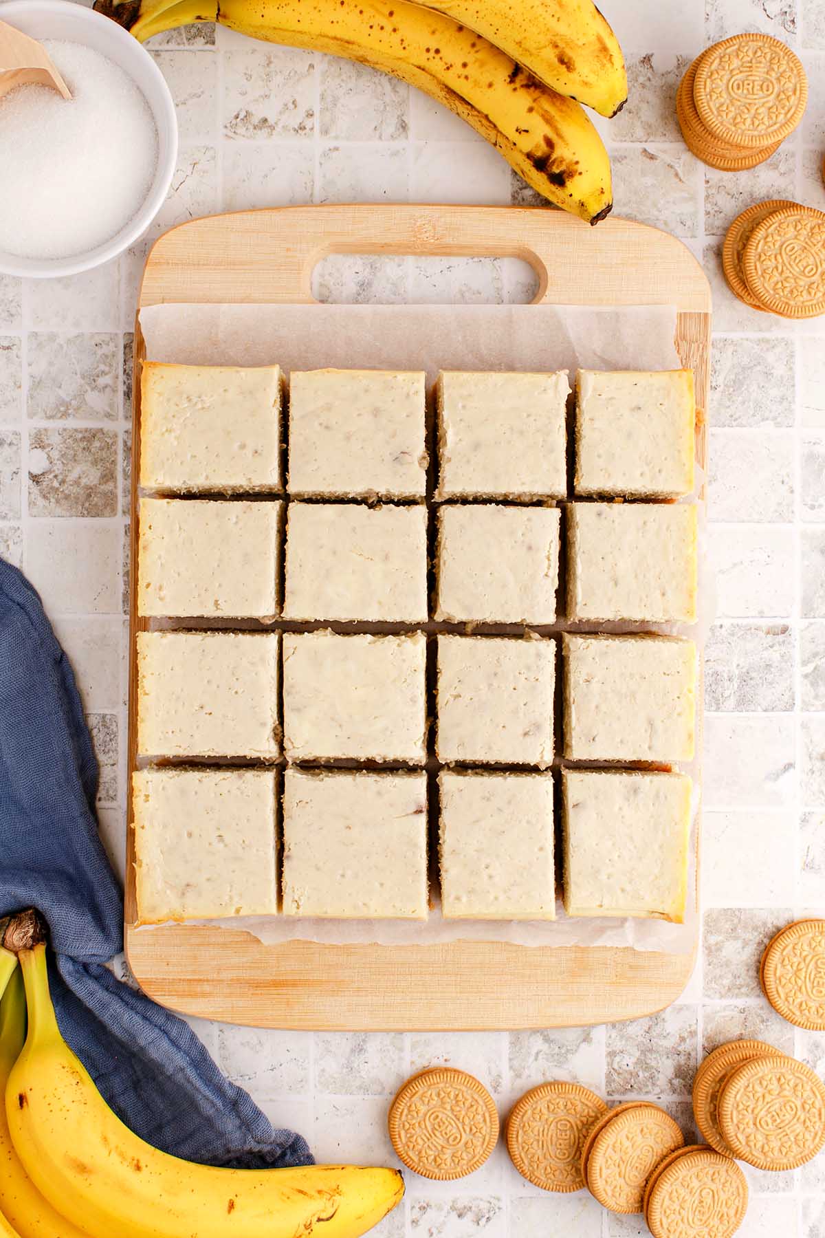 Banana Cream Pie Cheesecake Bars cut into squares