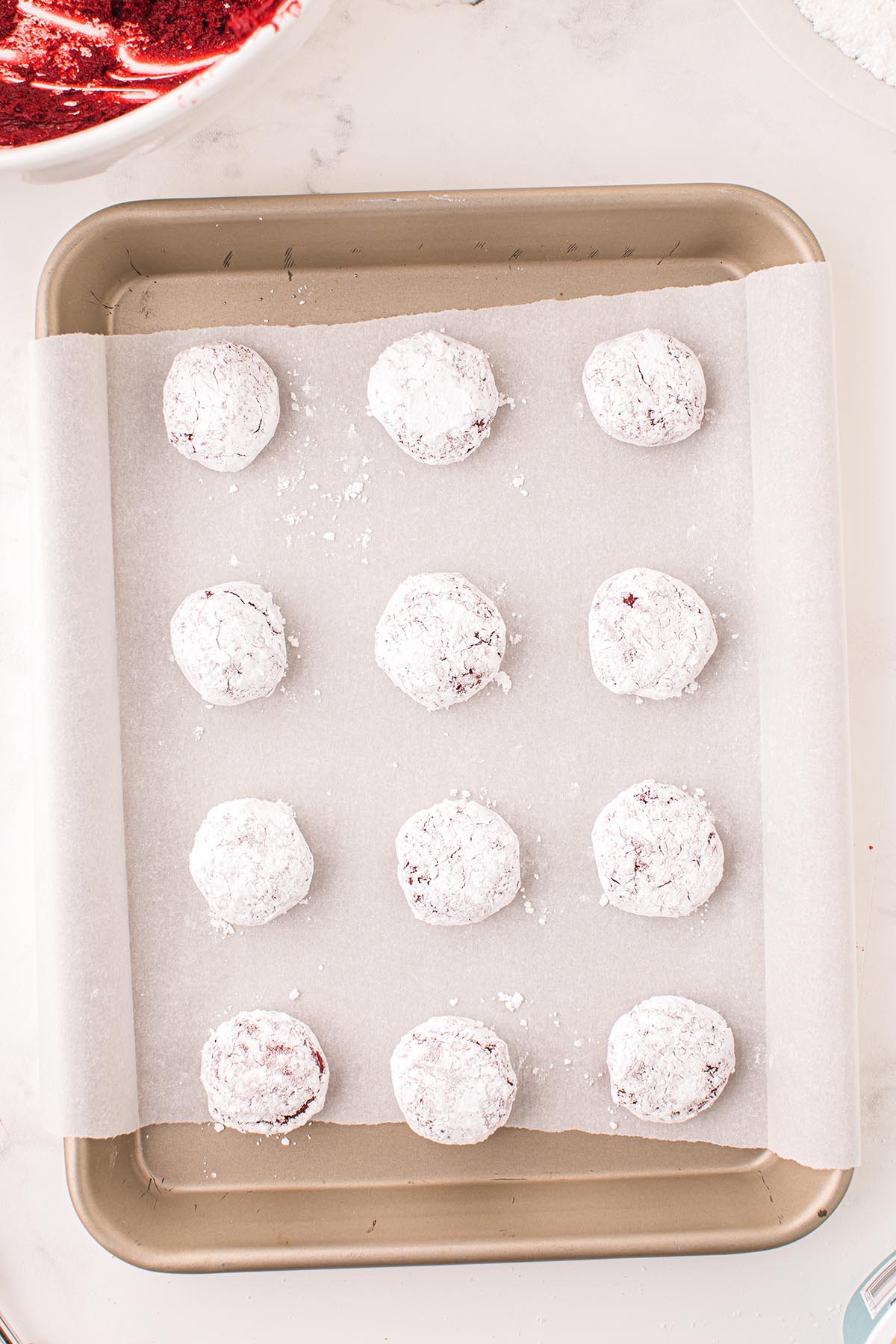 coat all cookie dough in powdered sugar.