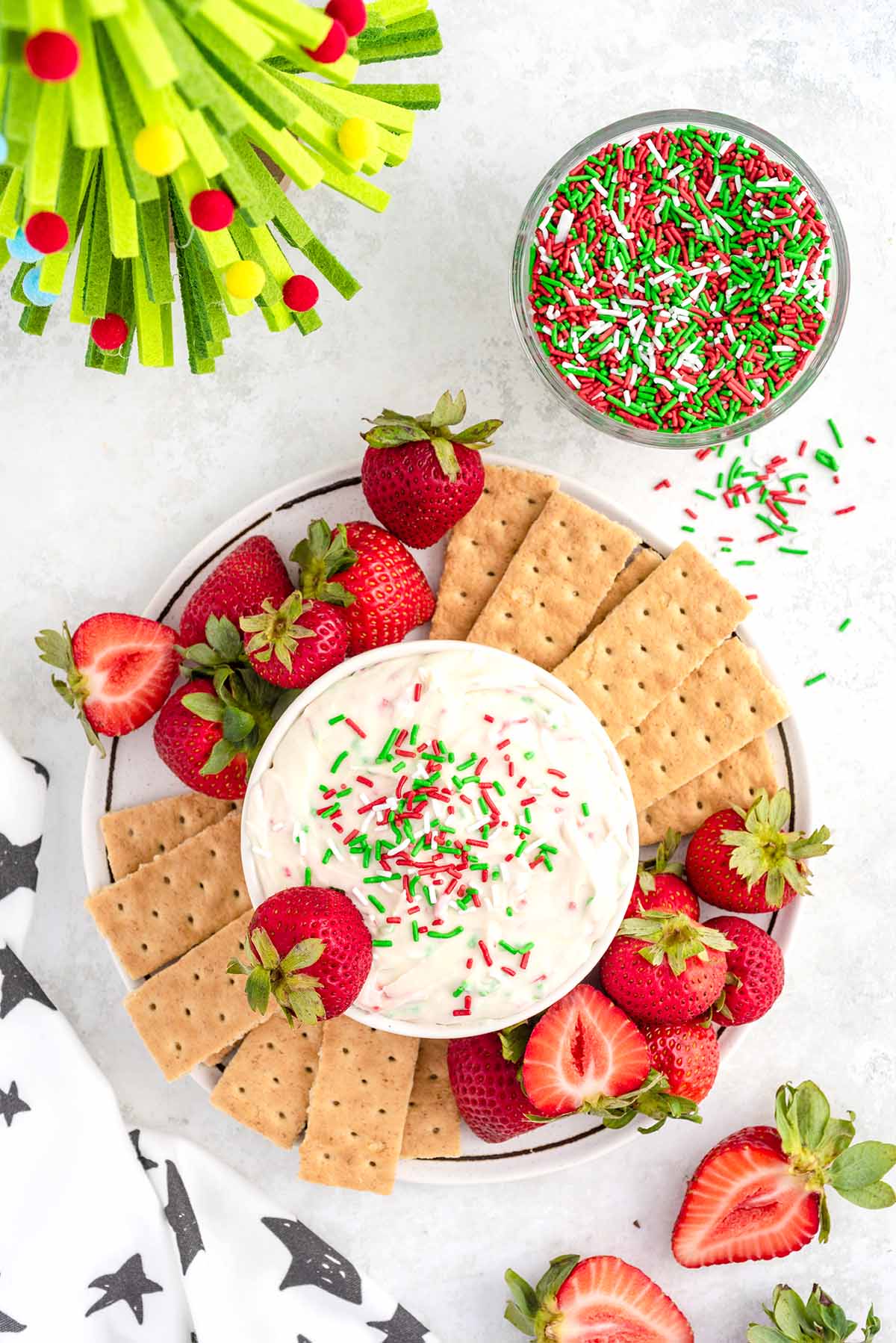 top shot of Christmas Sugar Cookie Dip with strawberries