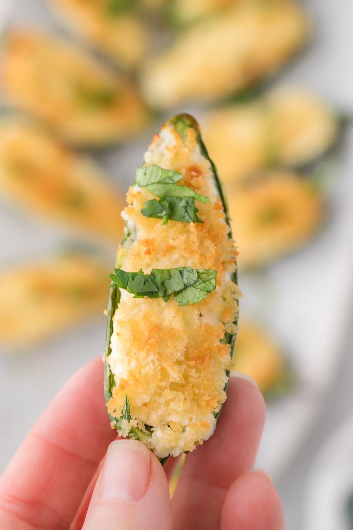 hand holding Air Fryer Jalapeno Poppers