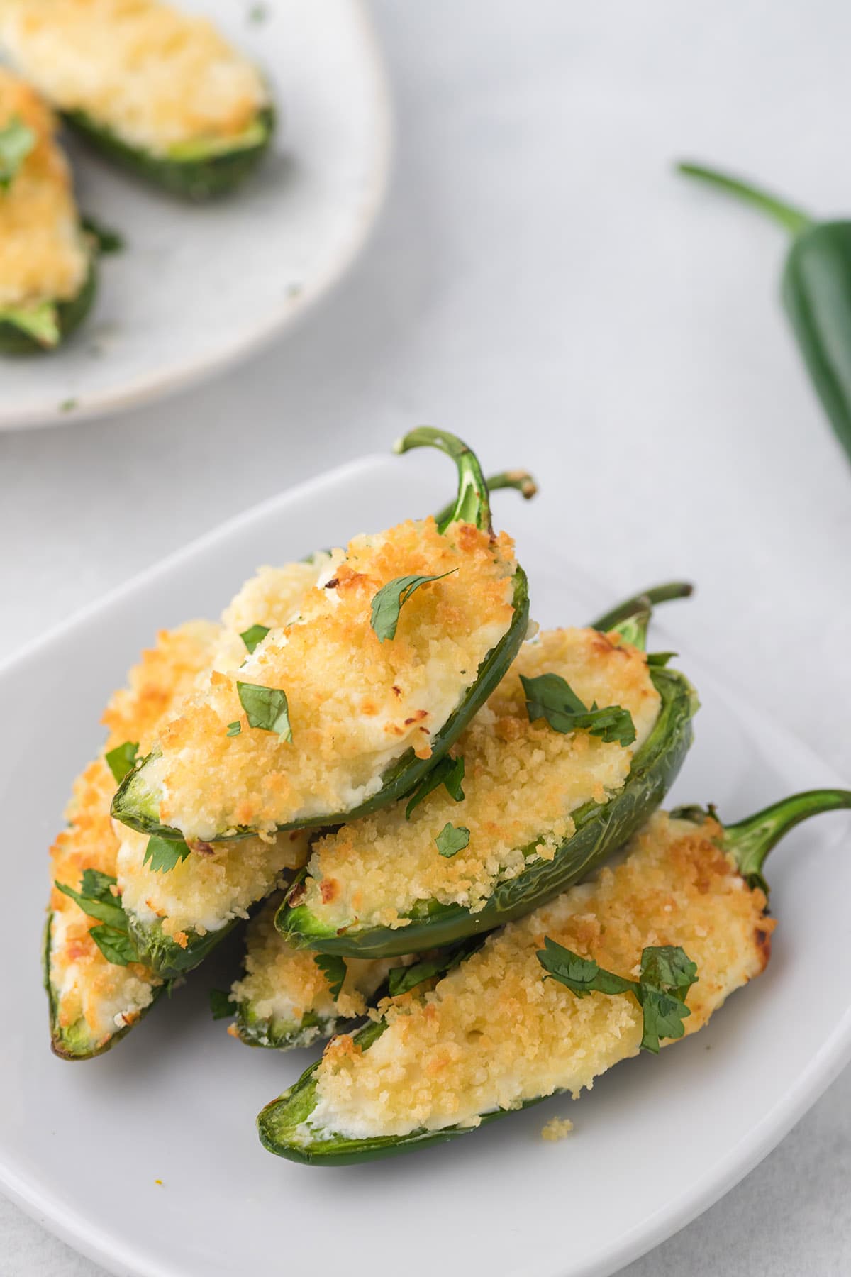 Air Fryer Jalapeno Poppers stacked up