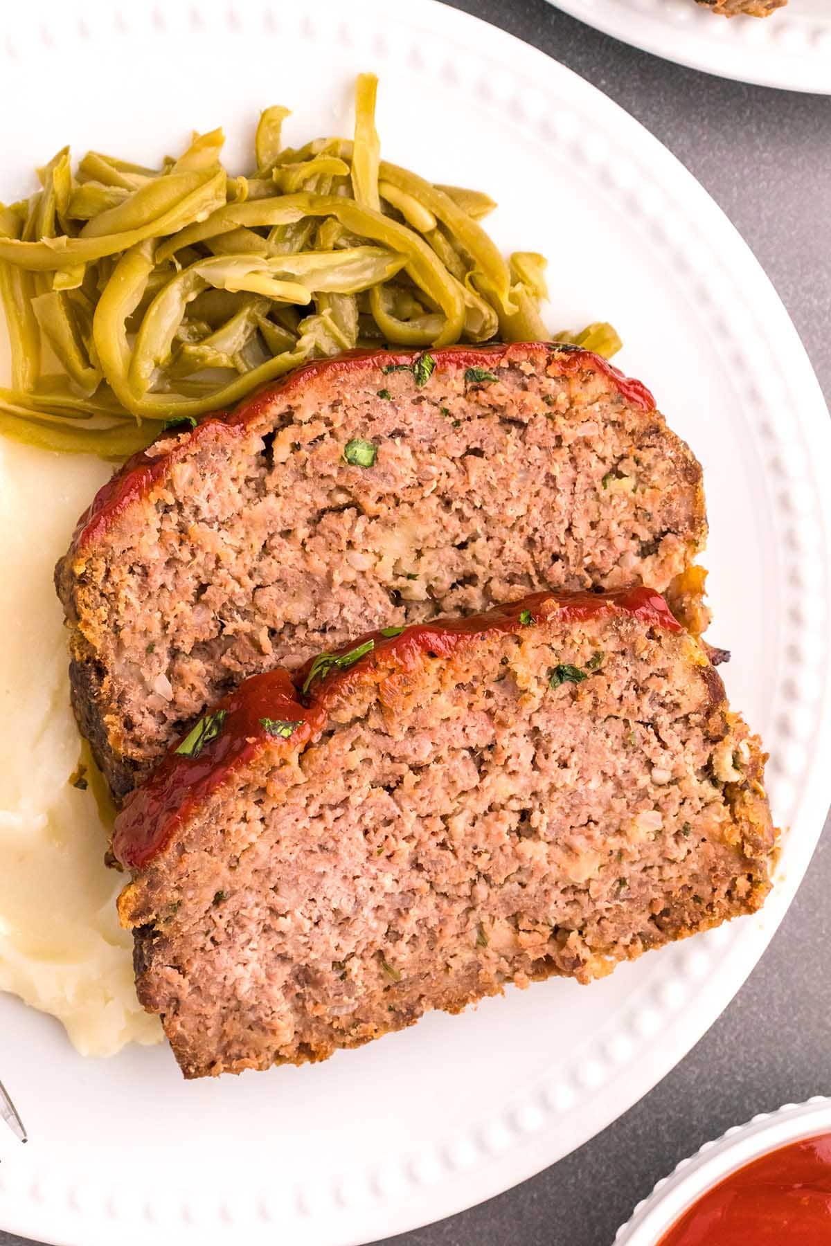2 slices of Meatloaf on a plate