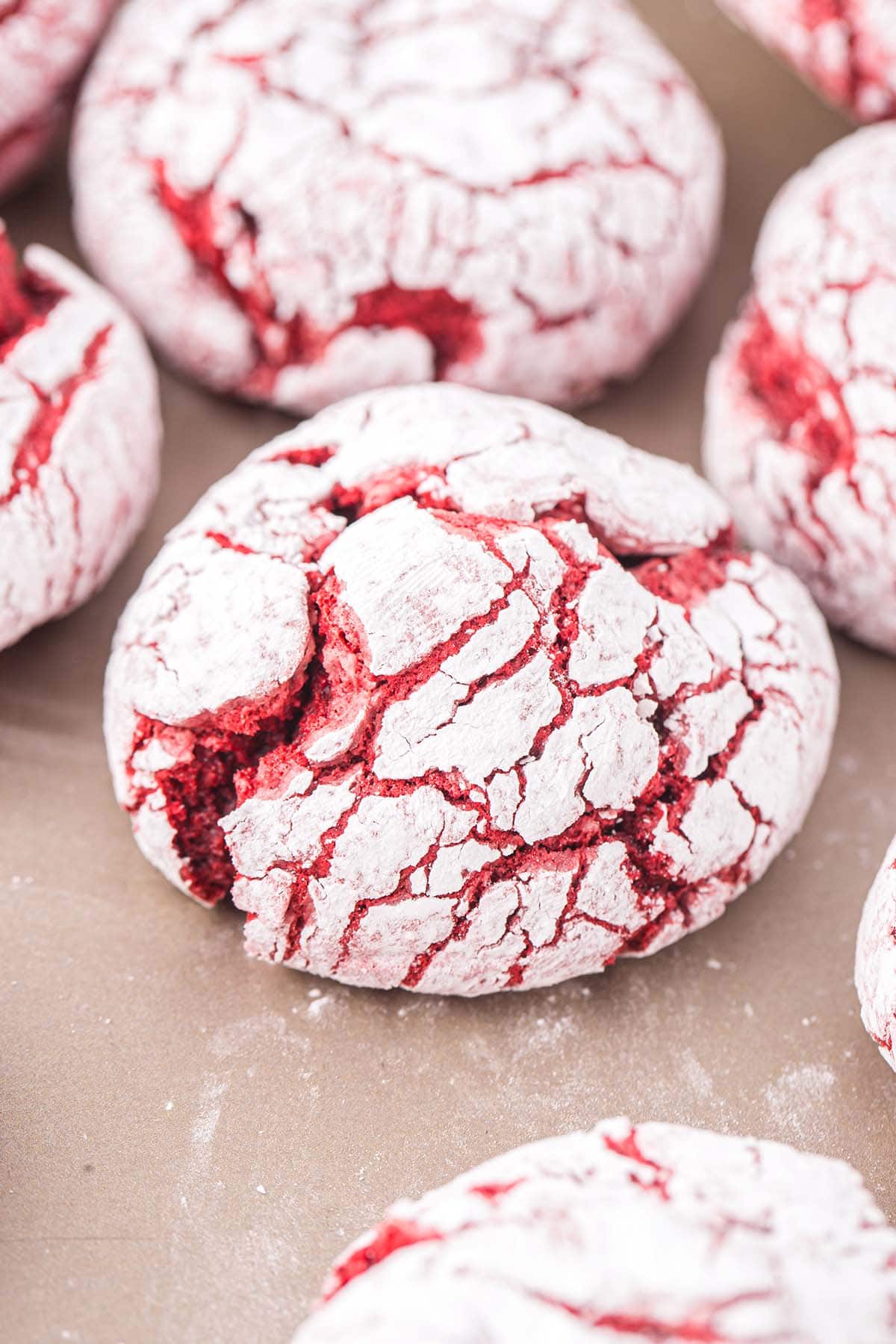 red velvet crinkle cookies with powdered sugar