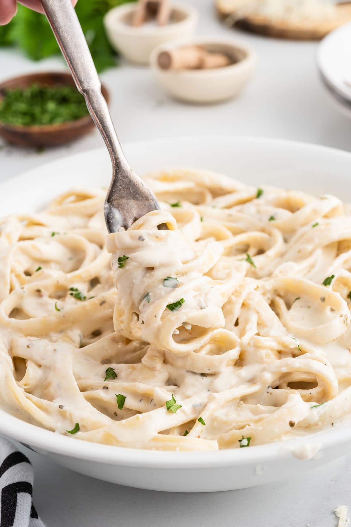 eating Cream Cheese sauce with pasta