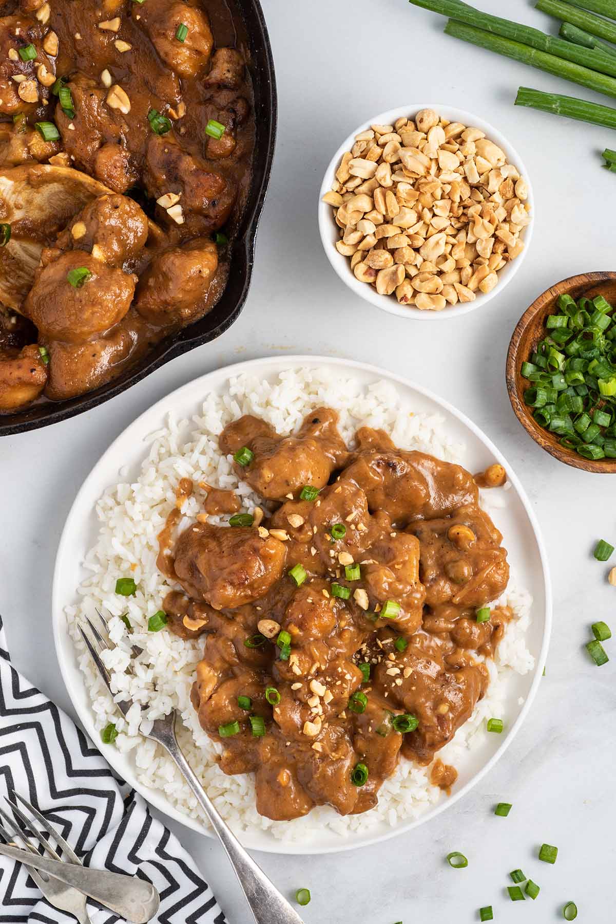 top shot of Peanut Butter Chicken with peanuts and green onion