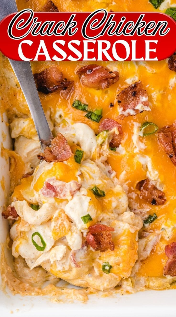 A stainless steel spoon digging into Crack Chicken casserole.
