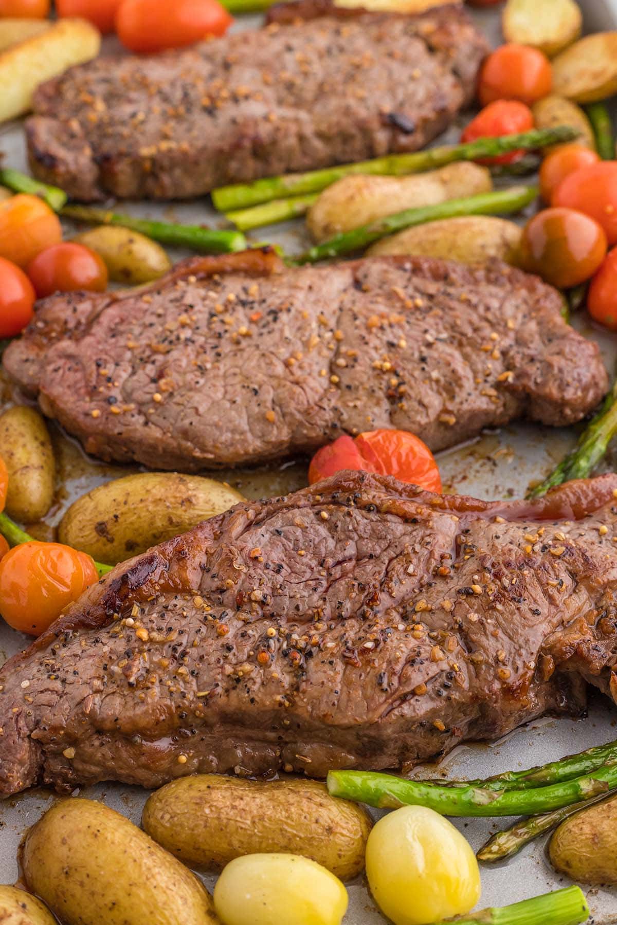 zoom in shot of Sheet Pan Steak and Veggies on a tray