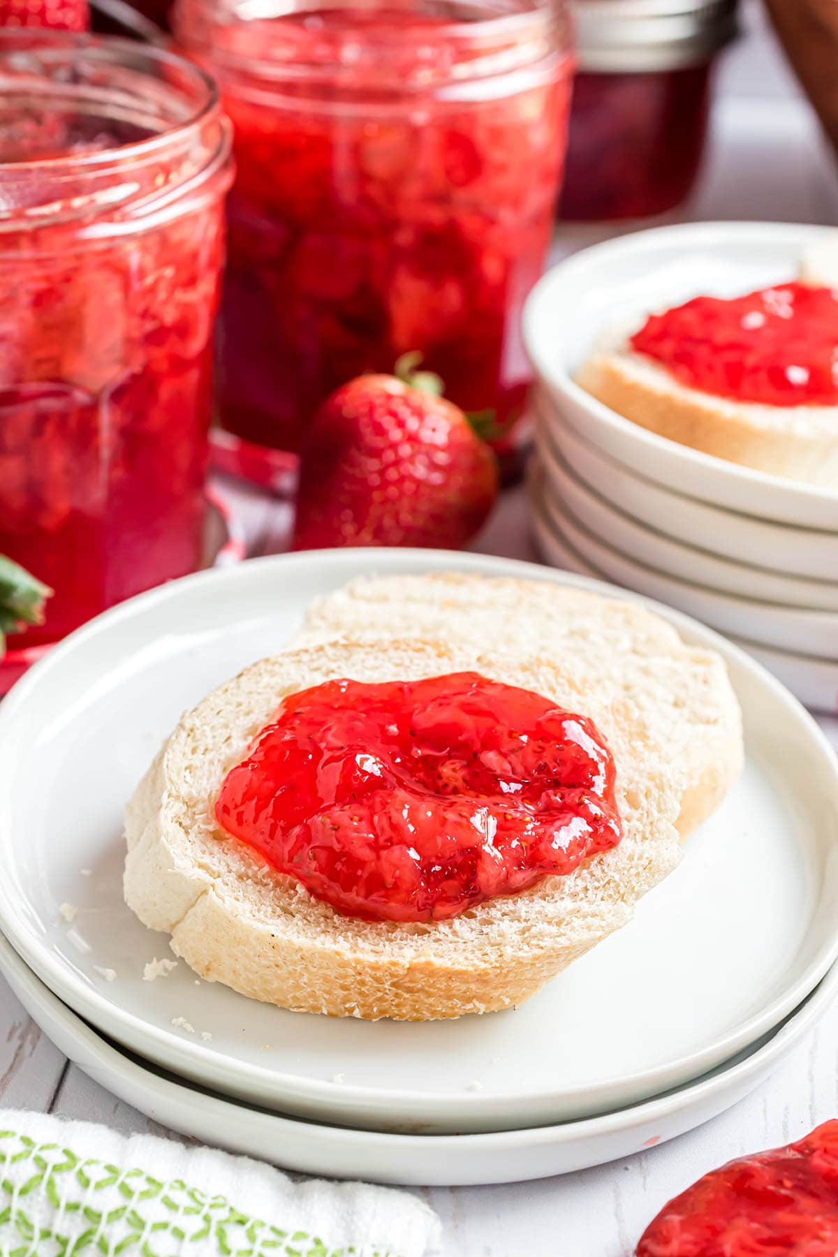 Strawberry jam on a slice of bread