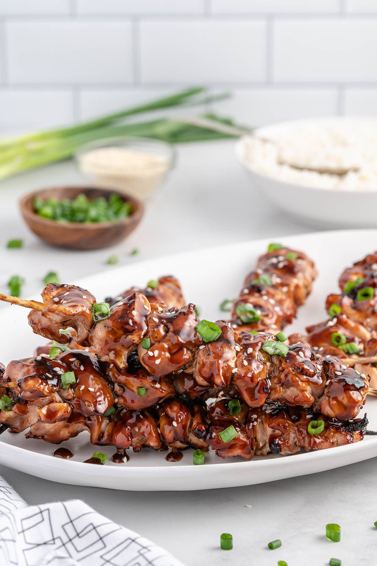 Teriyaki Chicken Skewers with green onion and sesame seed