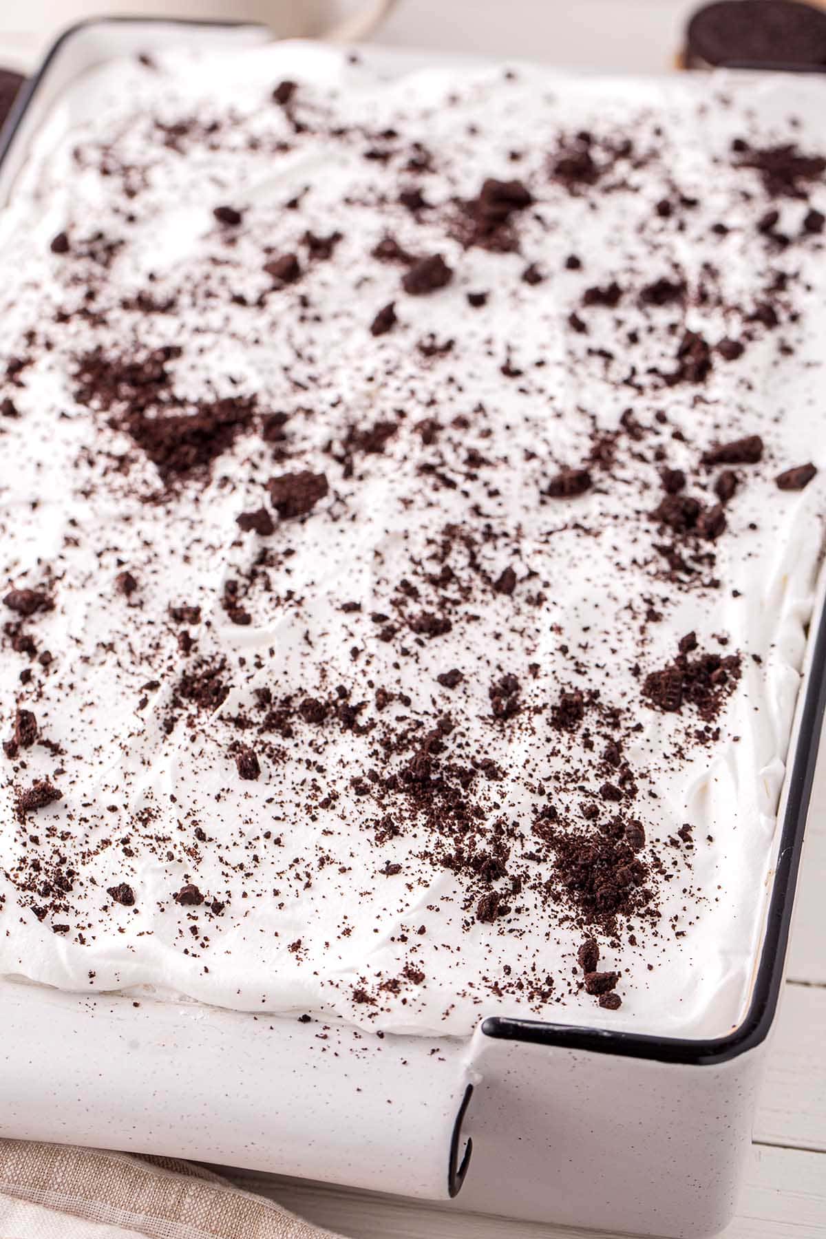 top shot of Cookies and Cream Poke Cake in a baking dish