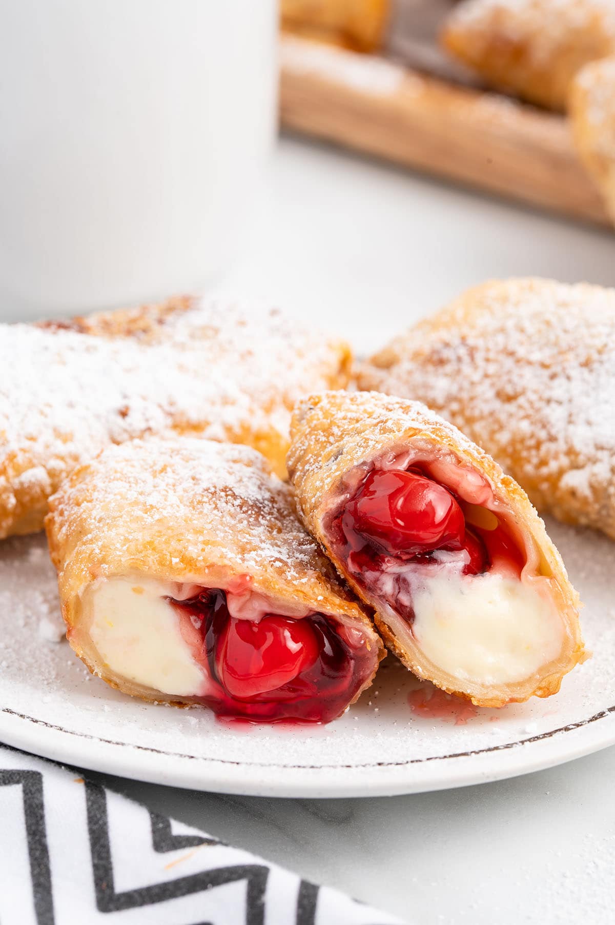Cherry Cheesecake Egg Rolls on a plate