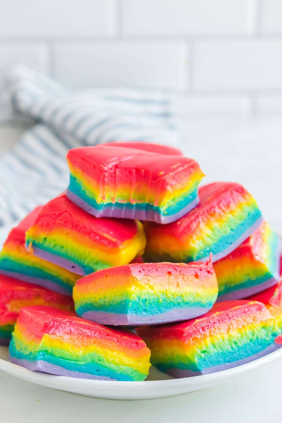 Rainbow Fudge stacked on a plate