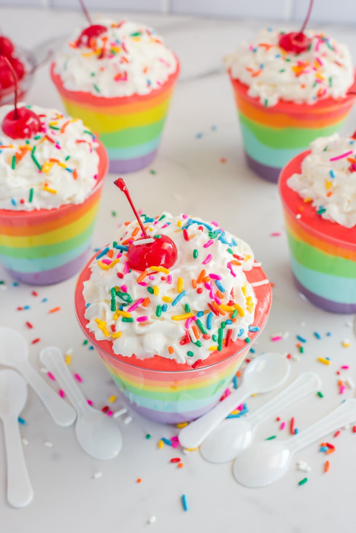 Rainbow Pudding Cups with whipped topping