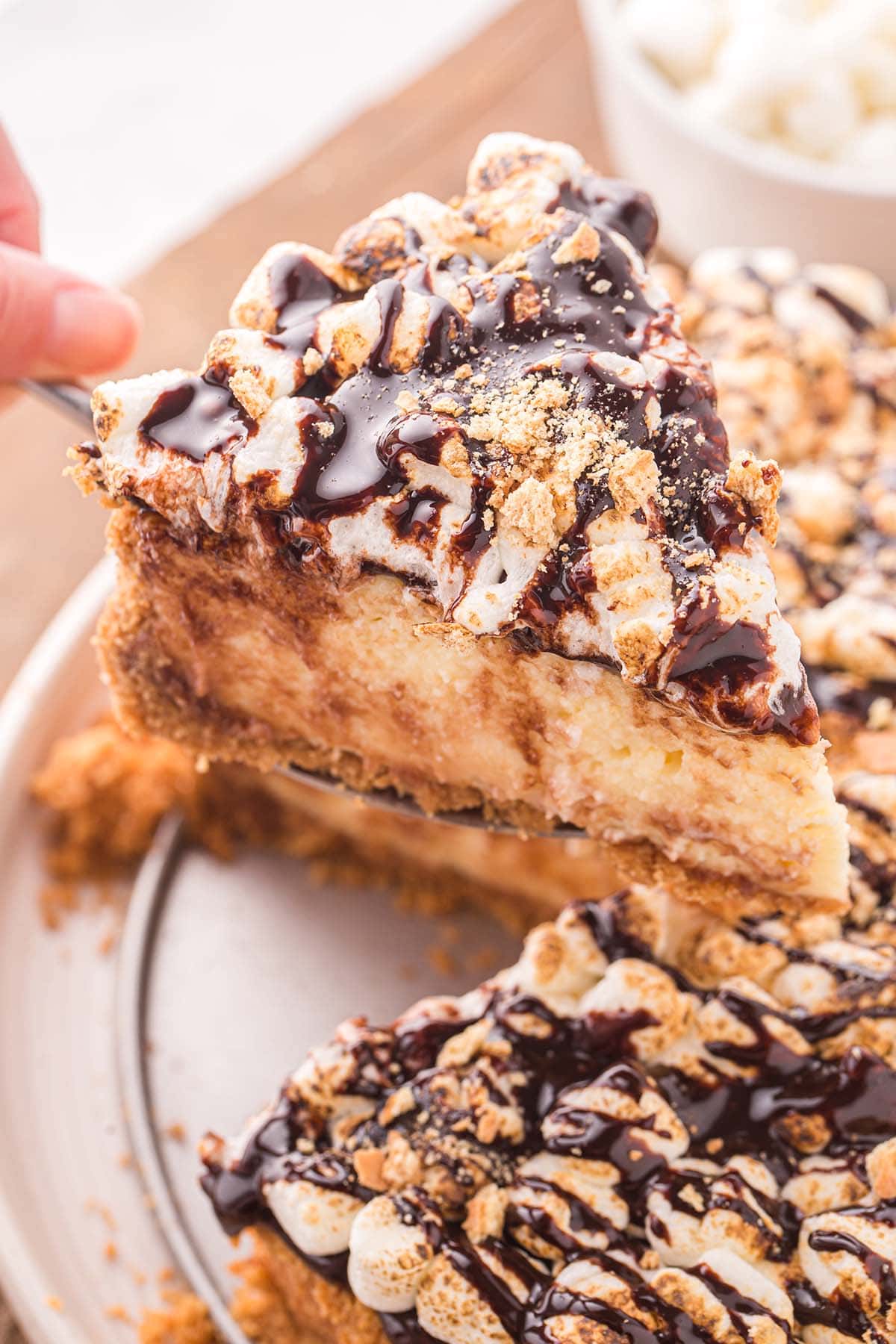 serving S'mores Cheesecake using spatula