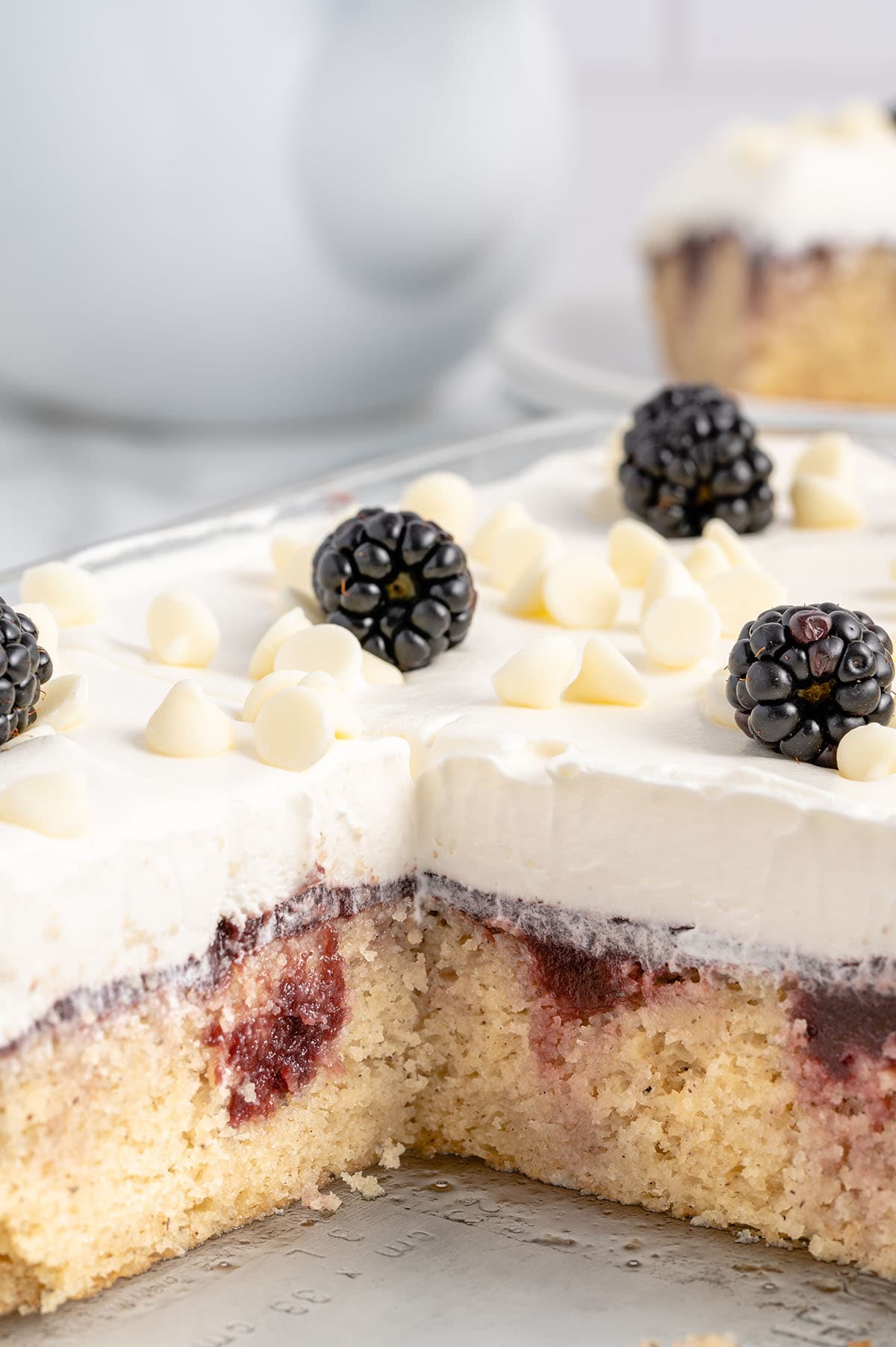 showing the inside of blackberry poke cake