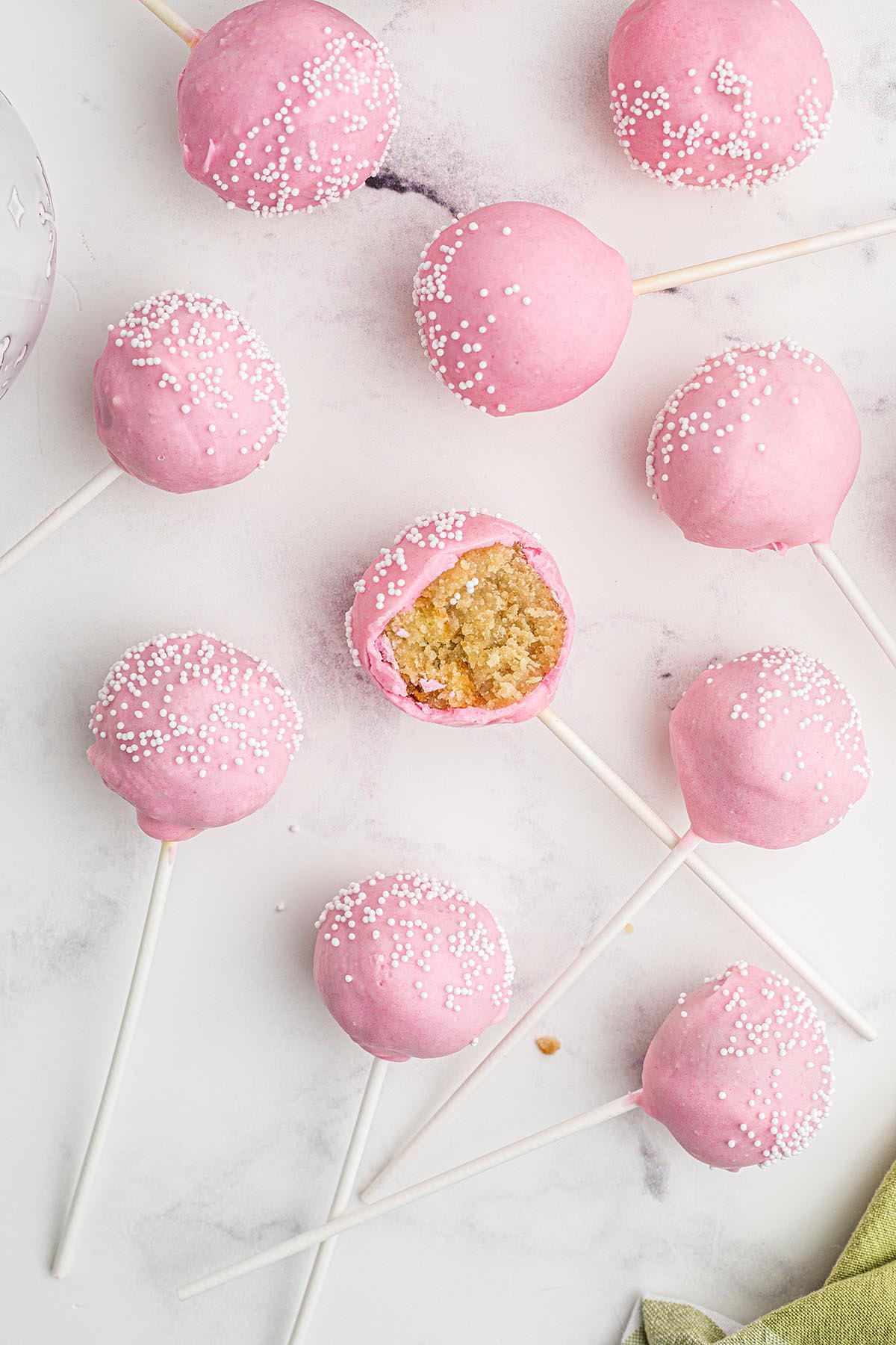 a couple of cake pops on a table