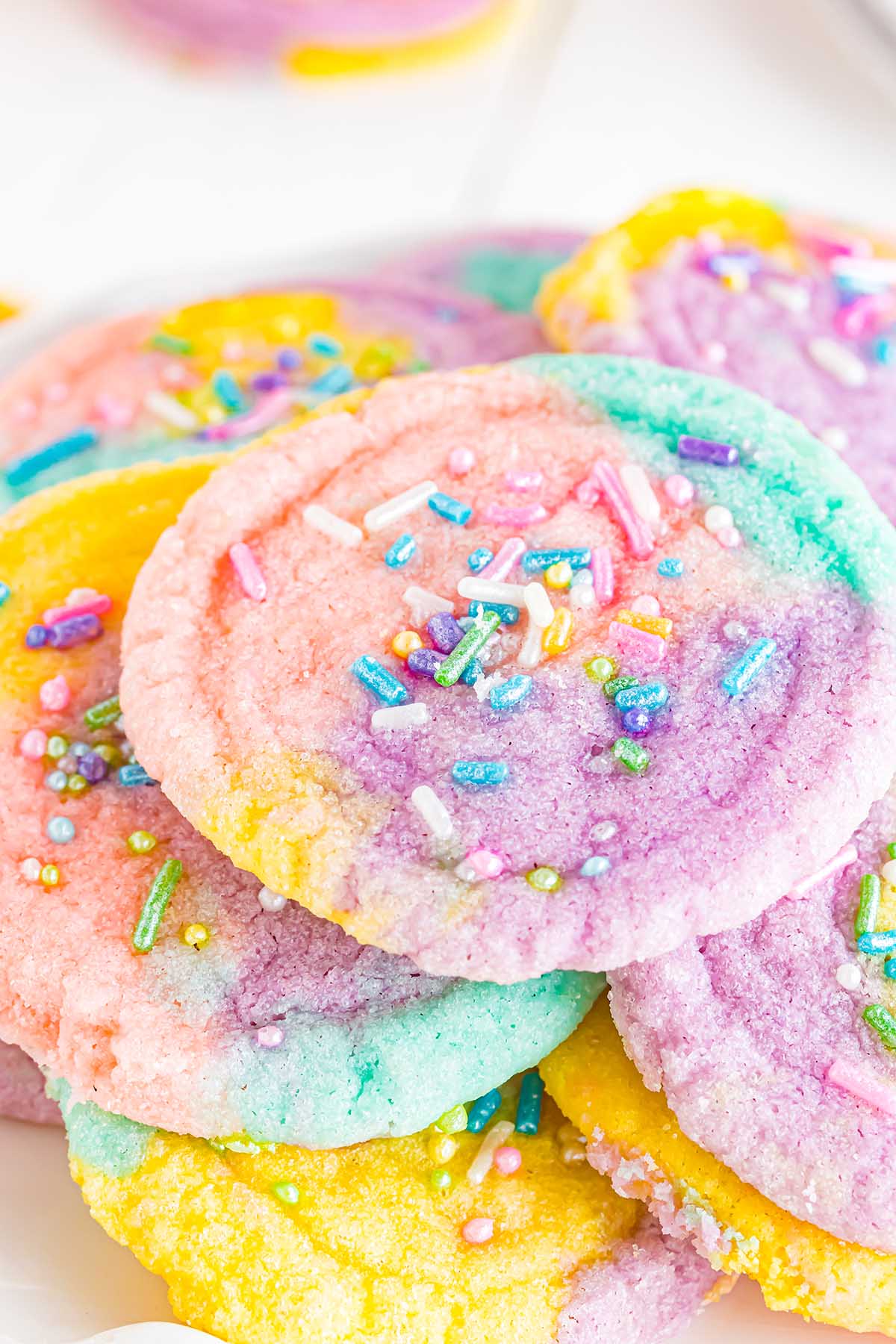 a couple pieces of unicorn cookies