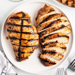 grilled chicken breast on a plate.
