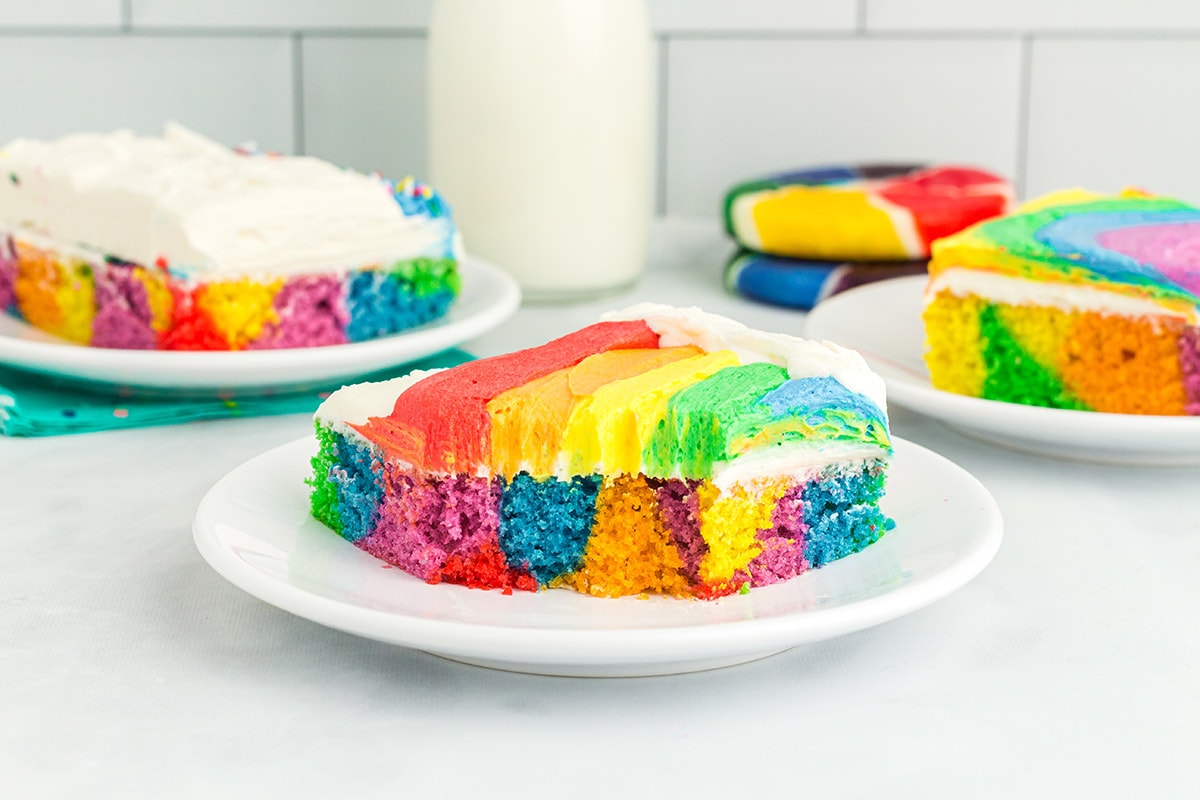 a square piece of Rainbow Sheet Cake