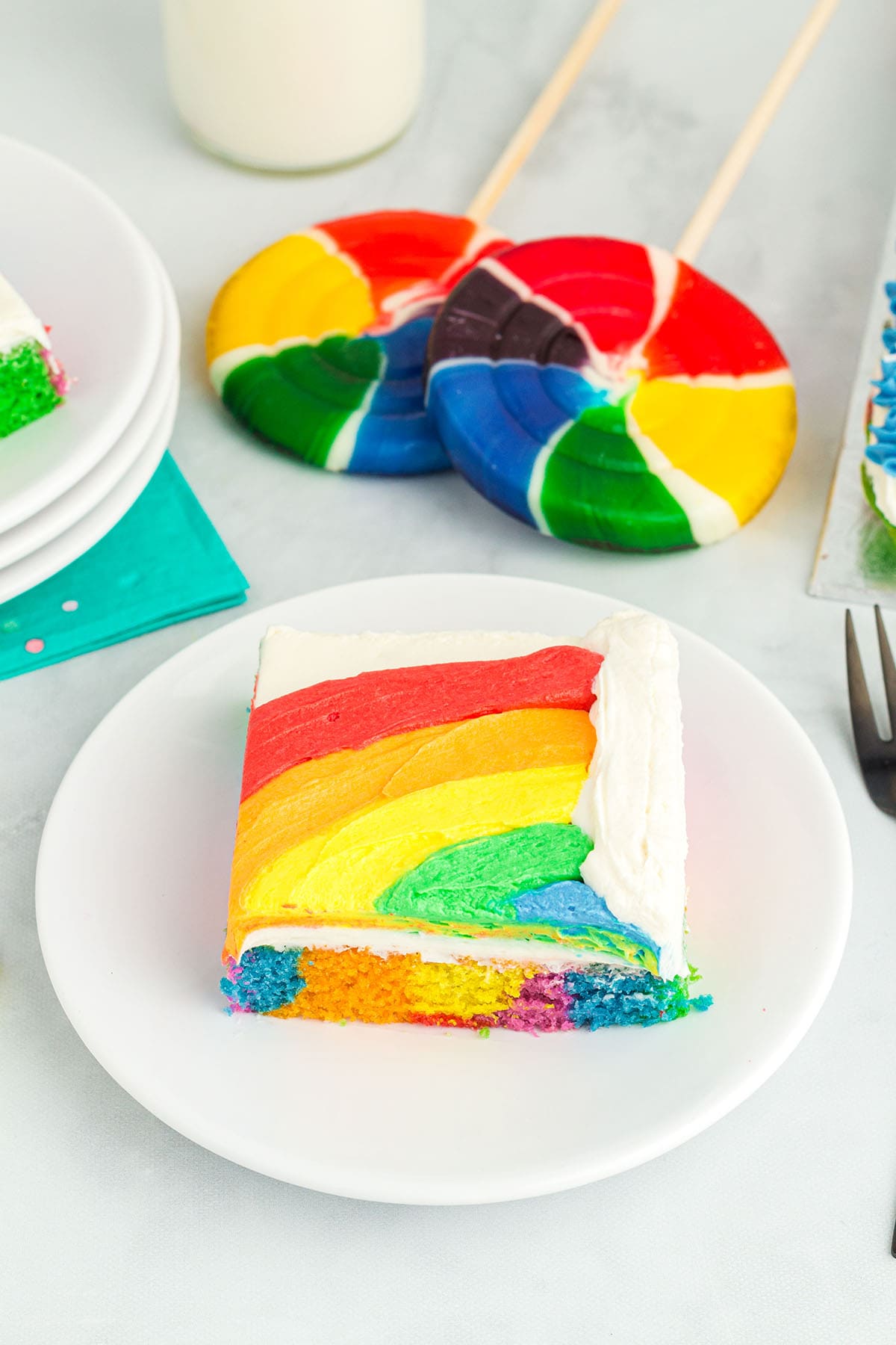 Rainbow Sheet Cake on a plate