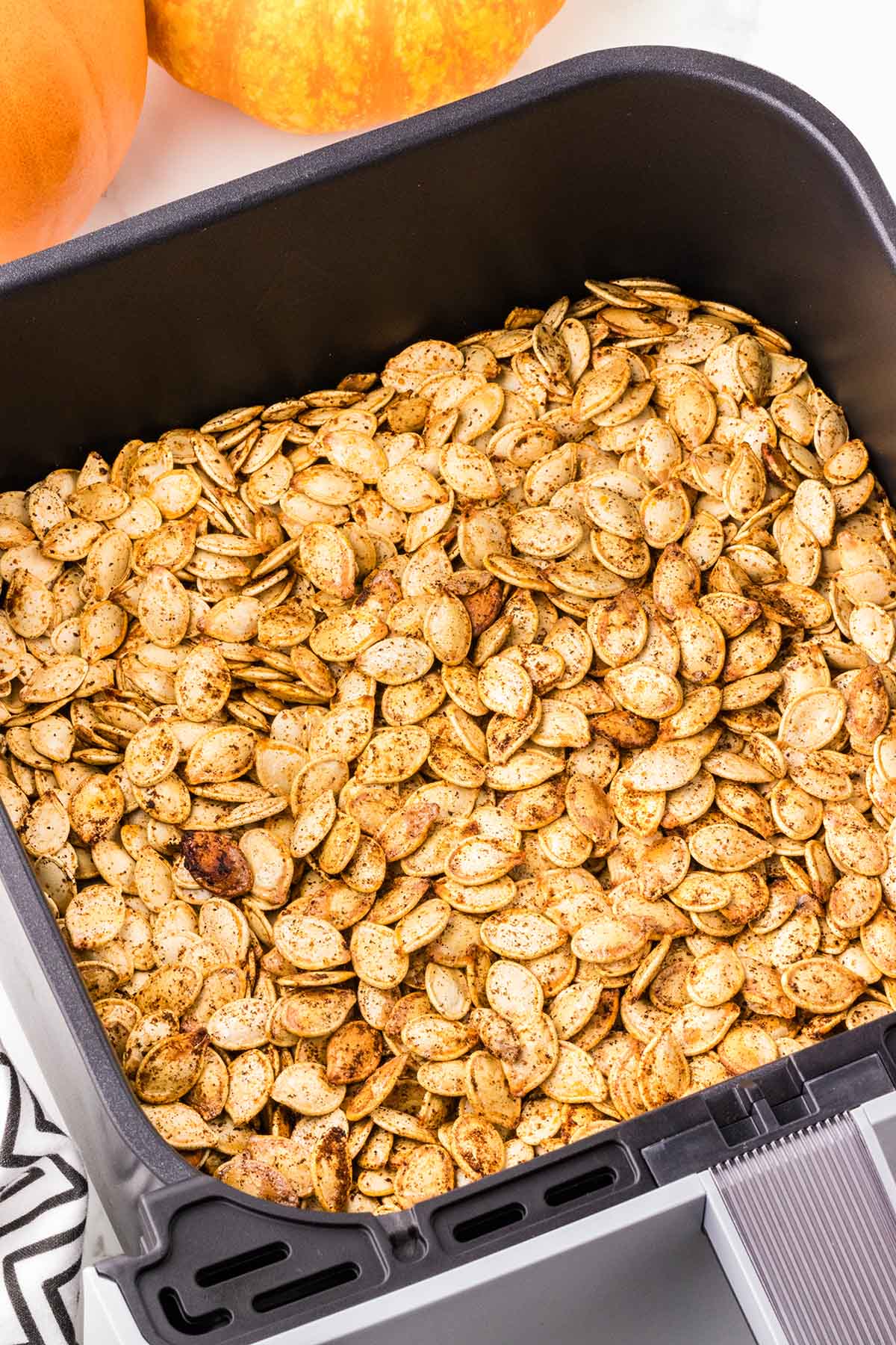 pumpkin seeds cooked inside air fryer. 