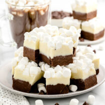 Hot Chocolate Fudge on a white plate with marshmallows